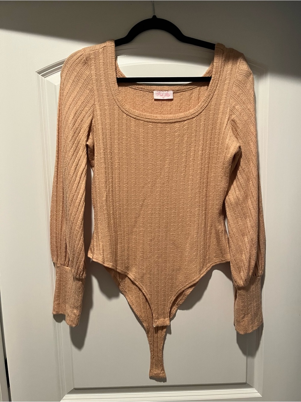 Pink Lily Ribbed Long Sleeve Bodysuit in Peach